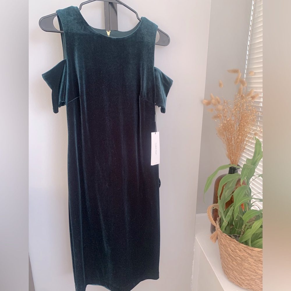 Calvin Kline cold shoulder green velvet dress.